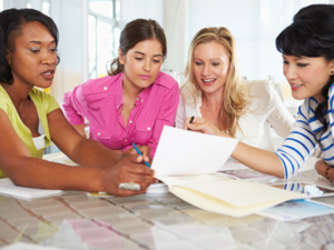 Group-Of-Women-Meeting-In-Creative-Office