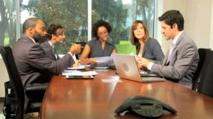 woman chairing a boardroom meeting