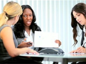 diverse women in the boardroom